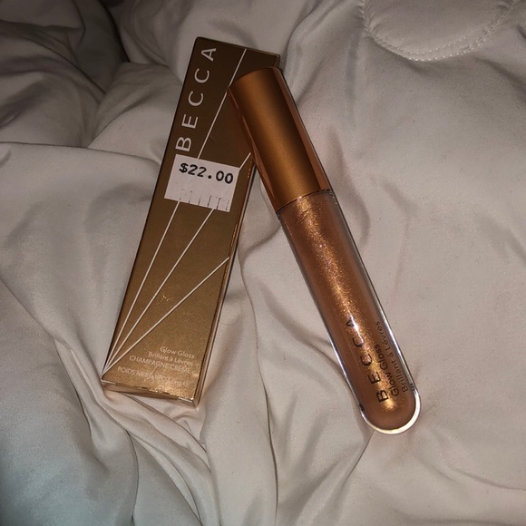 BECCA Other - BECCA Glow Gloss in “Champagne Crême”